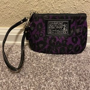 Purple coach wristlet wallet